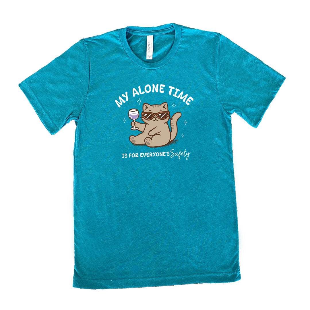 Teal colored shirt with a cat holding a wine glass graphic on it that says "My Alone Time Is For Everyone's Safety" 