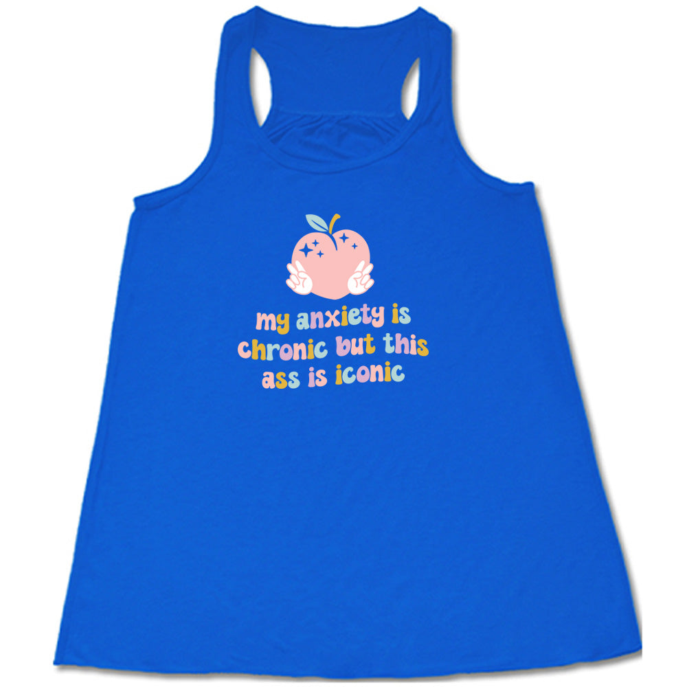 Blue colored flowy tank with a peach and peace signs graphic on it that says "My Anxiety Is Chronic But This Ass Is Iconic" 