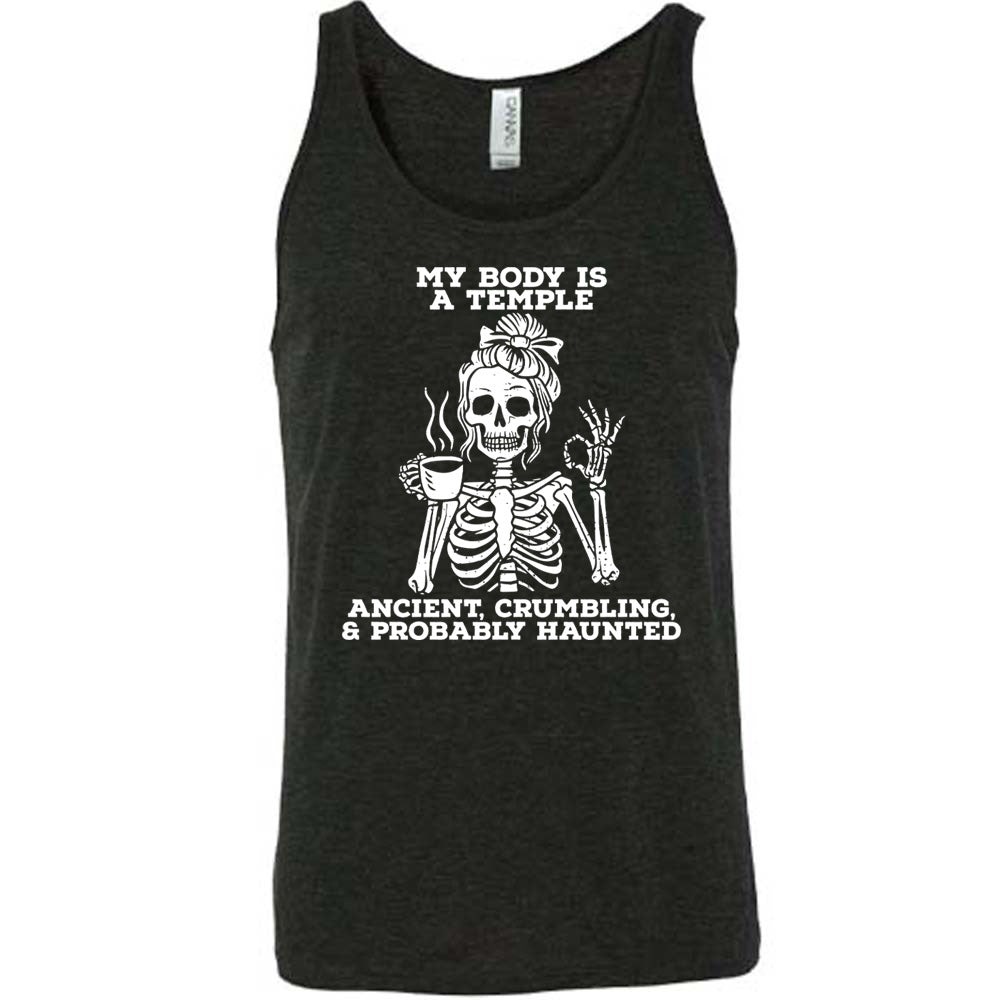 black unisex tank with the words "My Body Is a Temple Ancient, Crumbling, & Probably Haunted" on it, with the graphic of a skeleton with its hair in a bow, with one hand holding steaming coffee, and the other giving the OK symbol