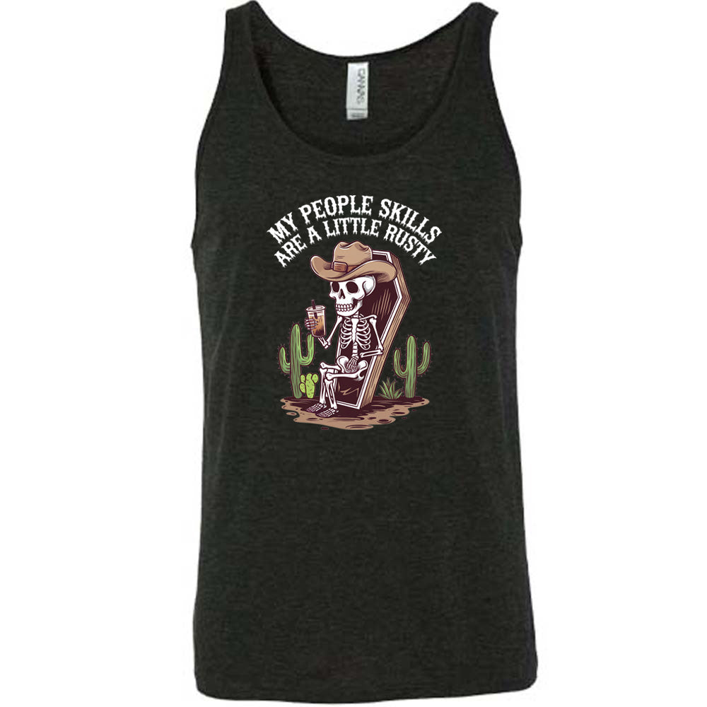 Black colored tank with a skeleton sitting in a coffin graphic on it that says "My People Skills Are A Little Rusty" 