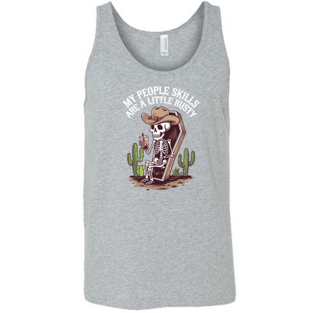 Grey colored tank with a skeleton sitting in a coffin graphic on it that says "My People Skills Are A Little Rusty" 