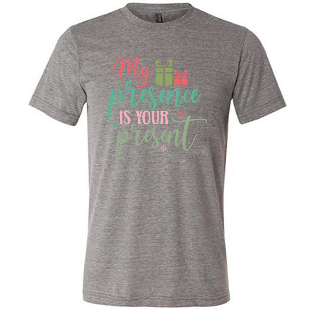 grey unisex tee with the words "my presence is your present" on it with two little present images