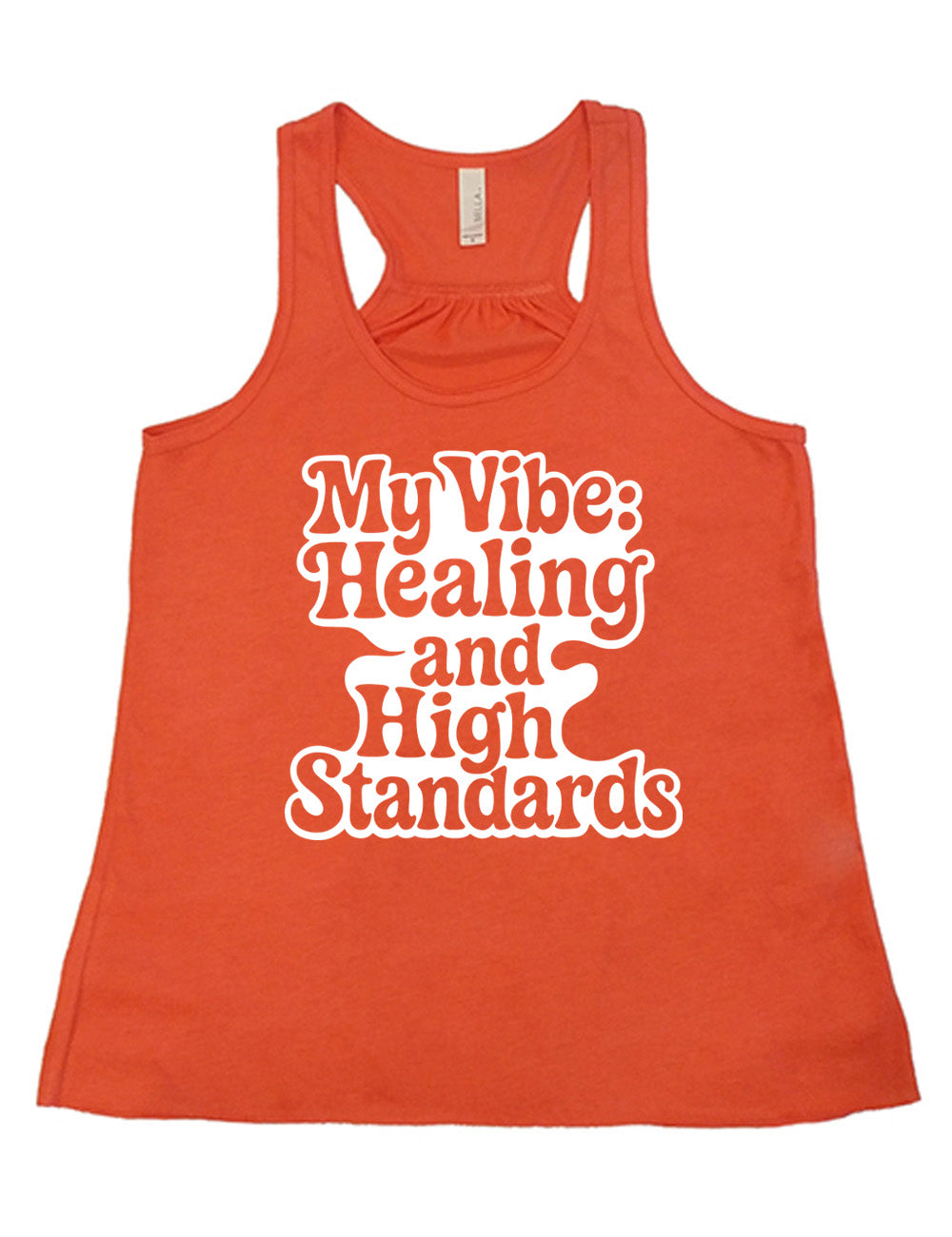 coral racerback flowy tank with the words "my vibe: healing and high standards" on it