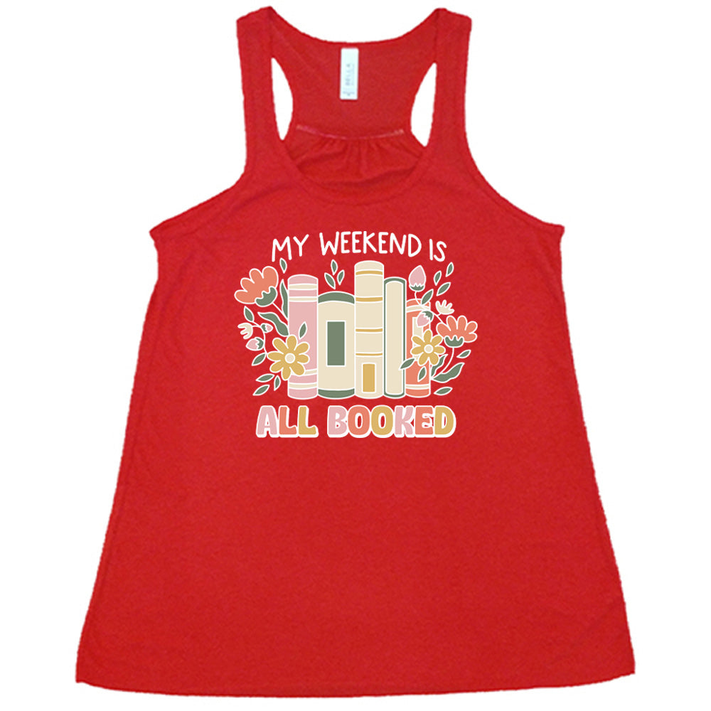 Red colored flowy tank with books and flowers graphic on it that says "My Weekend Is All Booked" 