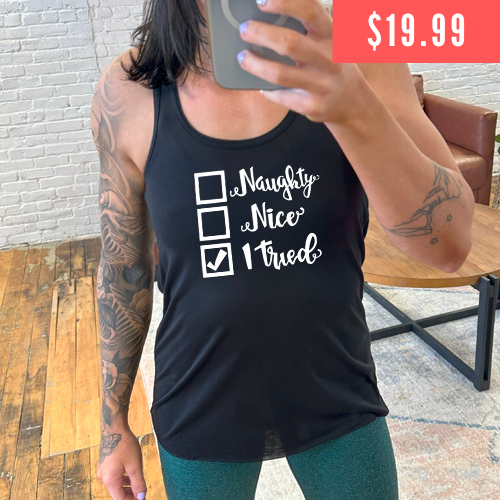 "Naughty, nice, I tried" black shirt with $19.99 sale language over the photo