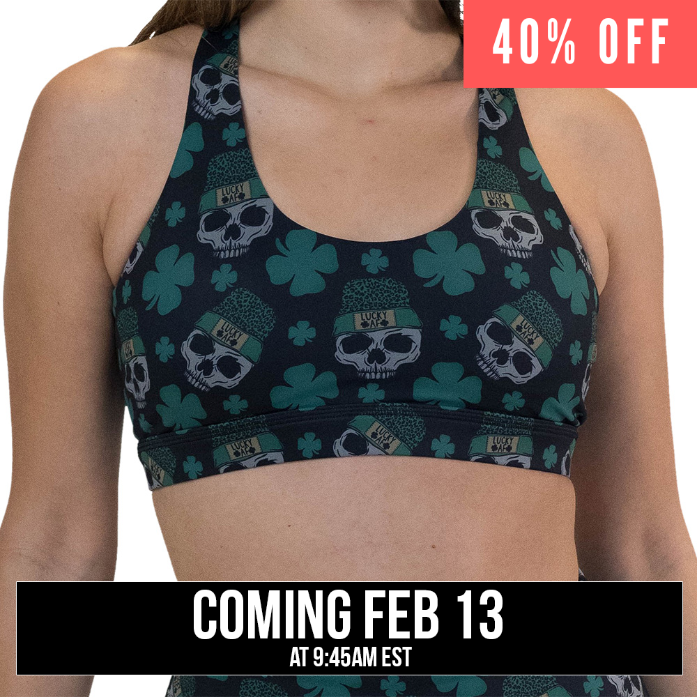 front of the skull and shamrock print sports bra, coming soon