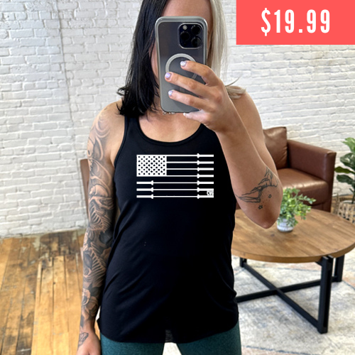model wearing black tank with a white barbell American flag design in the center