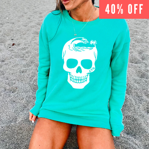 40% off of the mint crewneck with a white wave skull in the center