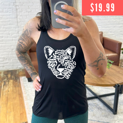 model wearing black tank top with tiger head design saying untamed on it that is now $19.99