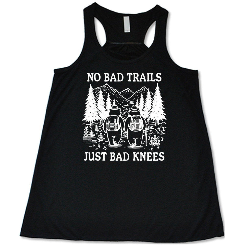 Black colored flowy tank with two bears hiking graphic on it that says "No Bad Trails Just Bad Knees" 
