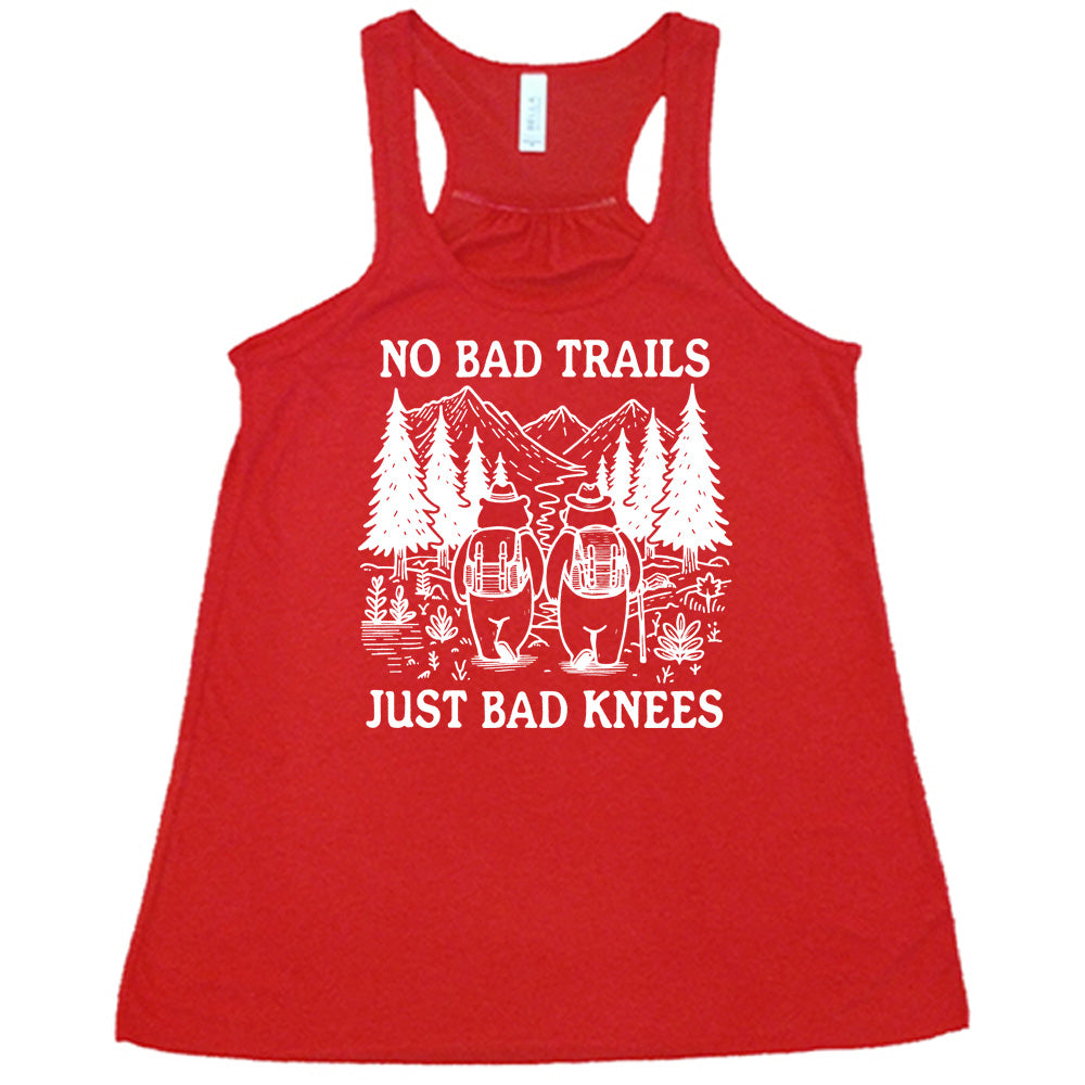 Red colored flowy tank with two bears hiking graphic on it that says "No Bad Trails Just Bad Knees" 