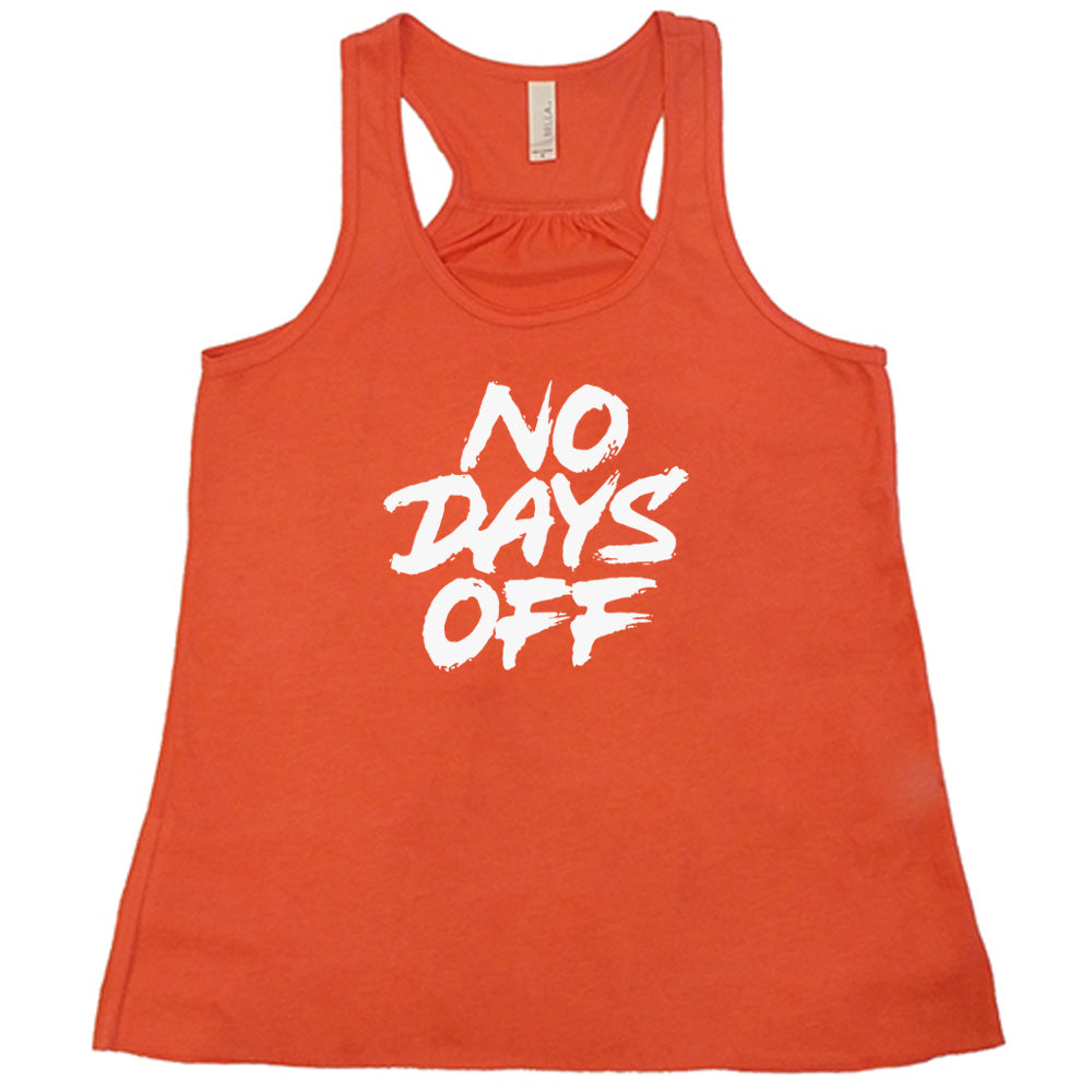 coral shirt with the text "No Days Off" on it