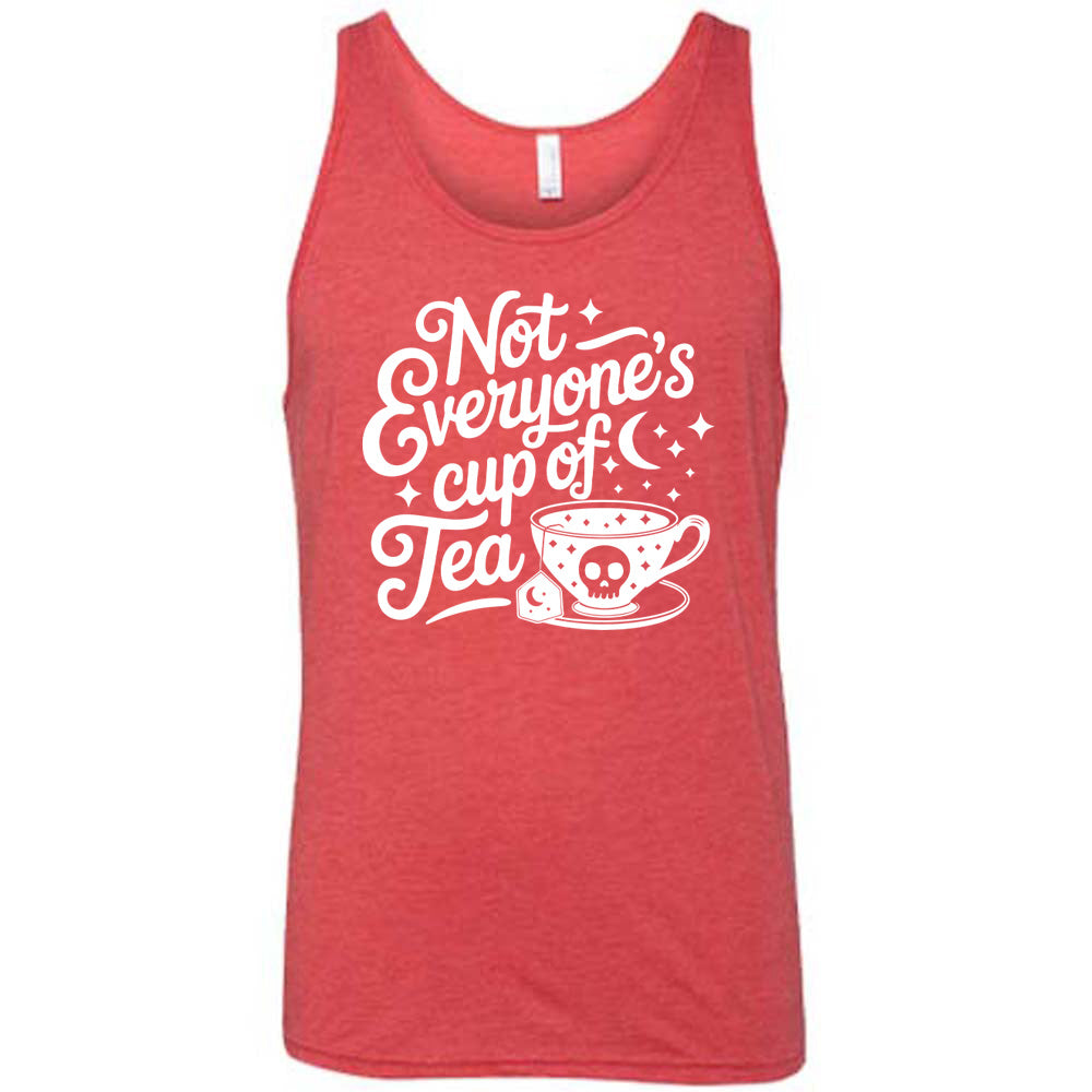 red unisex tank with the words "not everyone's cup of a tea" in a cursive font, with the graphics of a moon and little stars, and a tea cup with a skull on it with stars and the tea bag has a moon on it