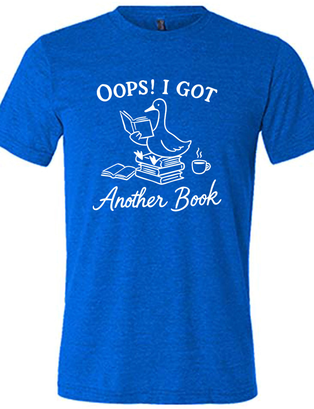 blue unisex tee with the graphic of a goose, sitting on a stack of books, reading a book, with another book open beside the stack, and a steaming cup of coffee on the other side, with the words around the graphic saying "Oops! I got another book" 