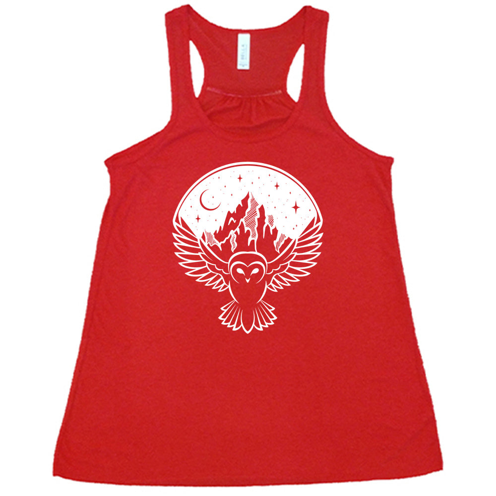Red colored flowy tank with night sky owl and mountain graphic on it