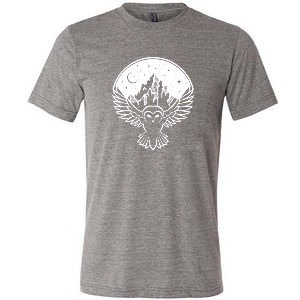 Grey colored shirt with night sky owl and mountain graphic on it