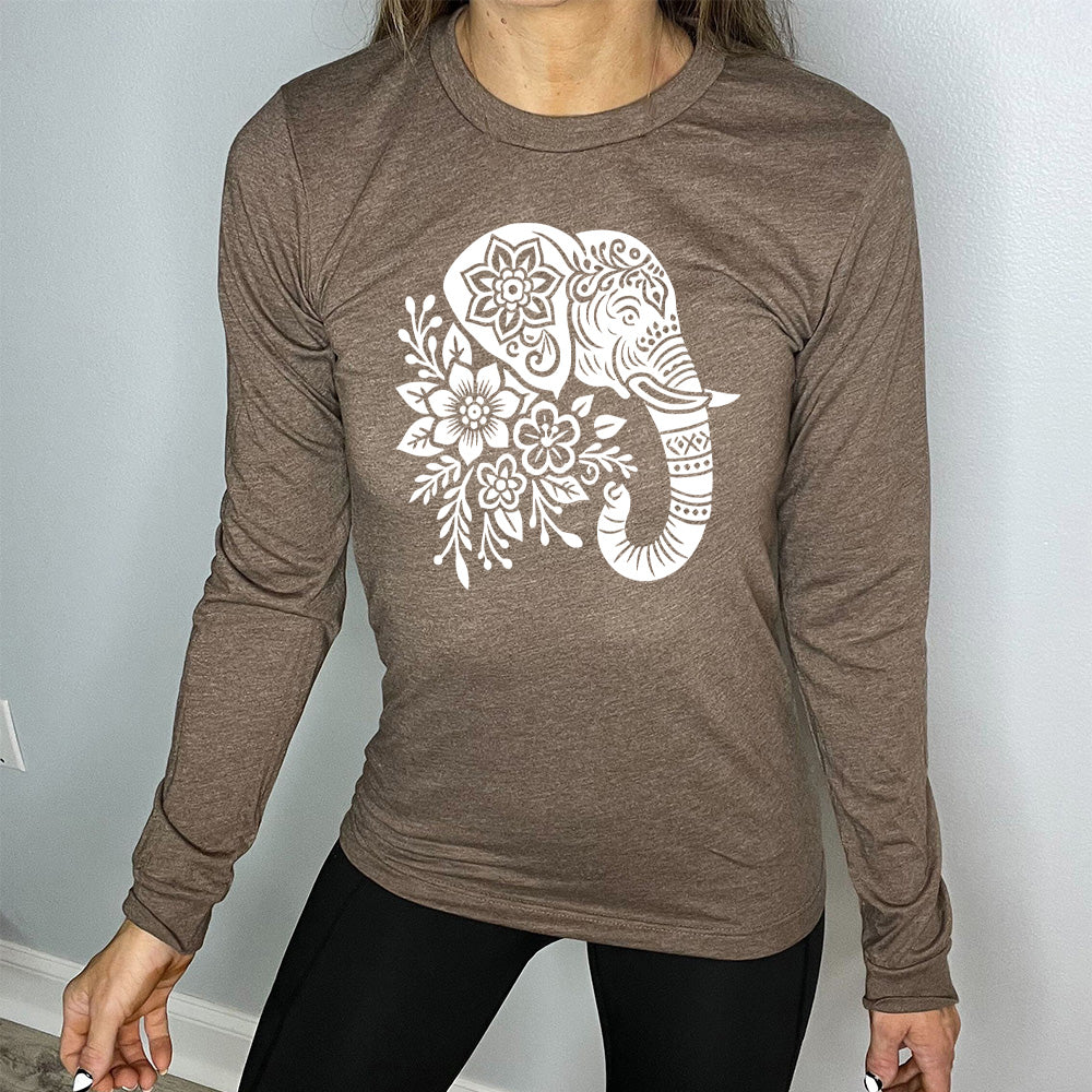 heather brown long sleeve tee with the large graphic of the profile of an elephant's head, with flowers for a torso, and patterns lining its truck and flowers patterned into its ear and forehead