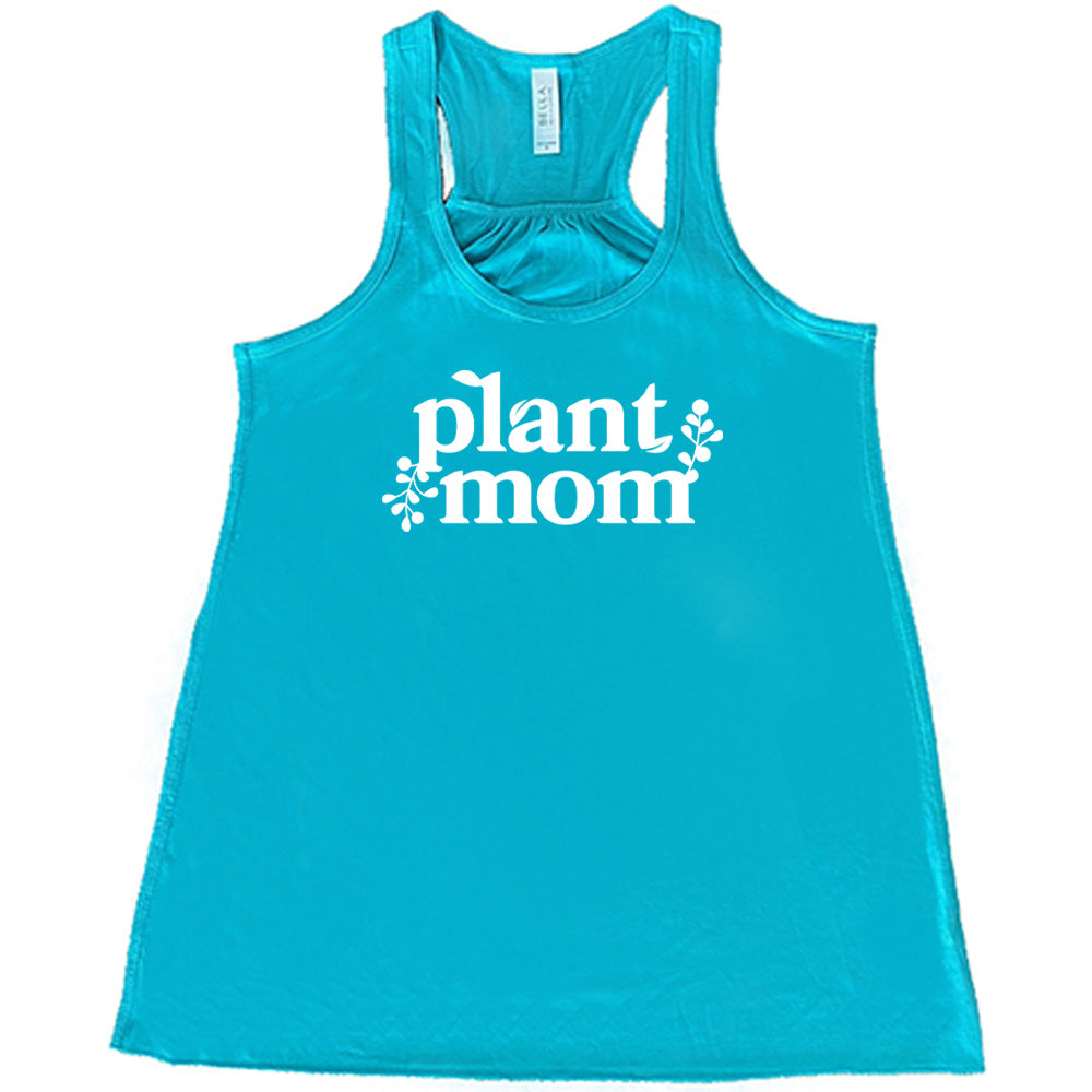 Teal colored flowy tank with a plant graphic on it that says "Plant Mom" 