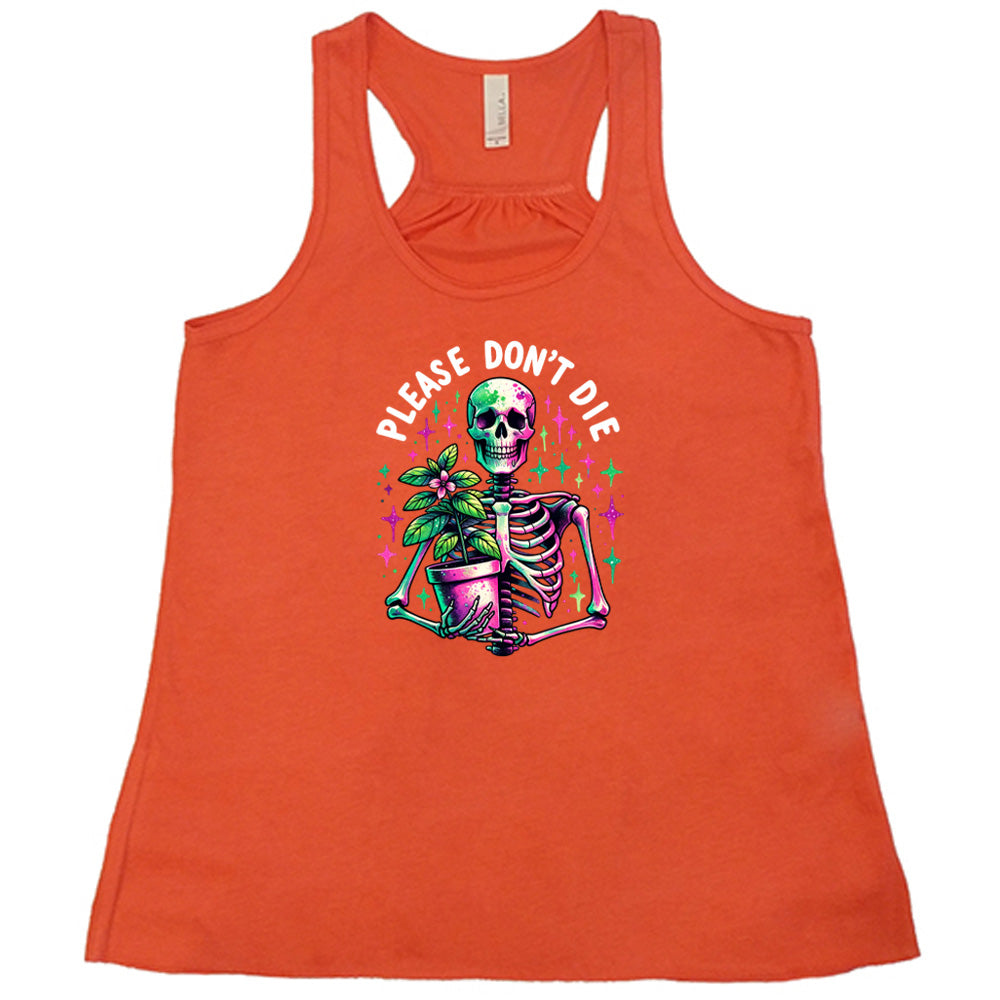 Coral colored flowy tank with a skeleton holding a plant graphic on it that says "Please Don't Die" 