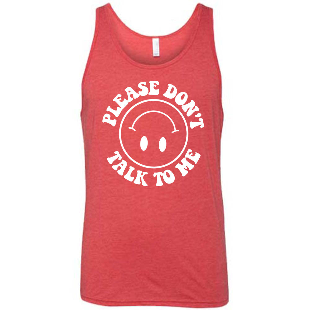 red unisex tank with the words "please don't talk to me" creating mirrored arcs around the outlined circle graphic of an upside-down happy face