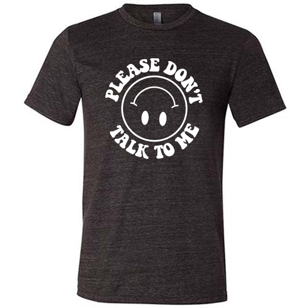 black unisex tee with the words "please don't talk to me" creating mirrored arcs around the outlined circle graphic of an upside-down happy face