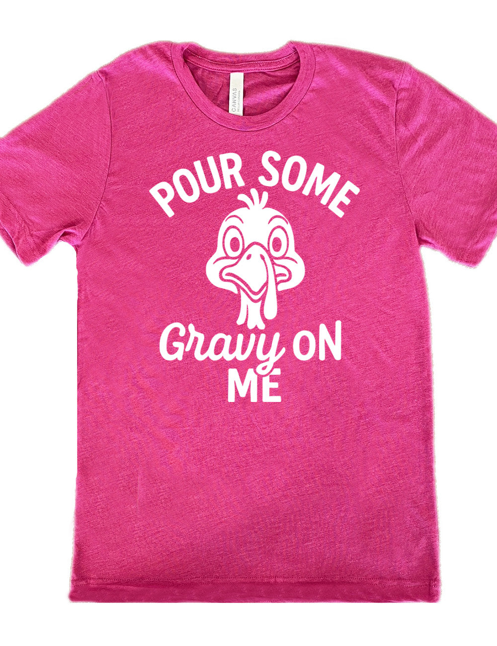 sunset unisex tee with the words "pour some gravy on me" on it, with "gravy" in cursive", and the words "pour some" slightly arching over the graphic of a turkey's head, eyes wide
