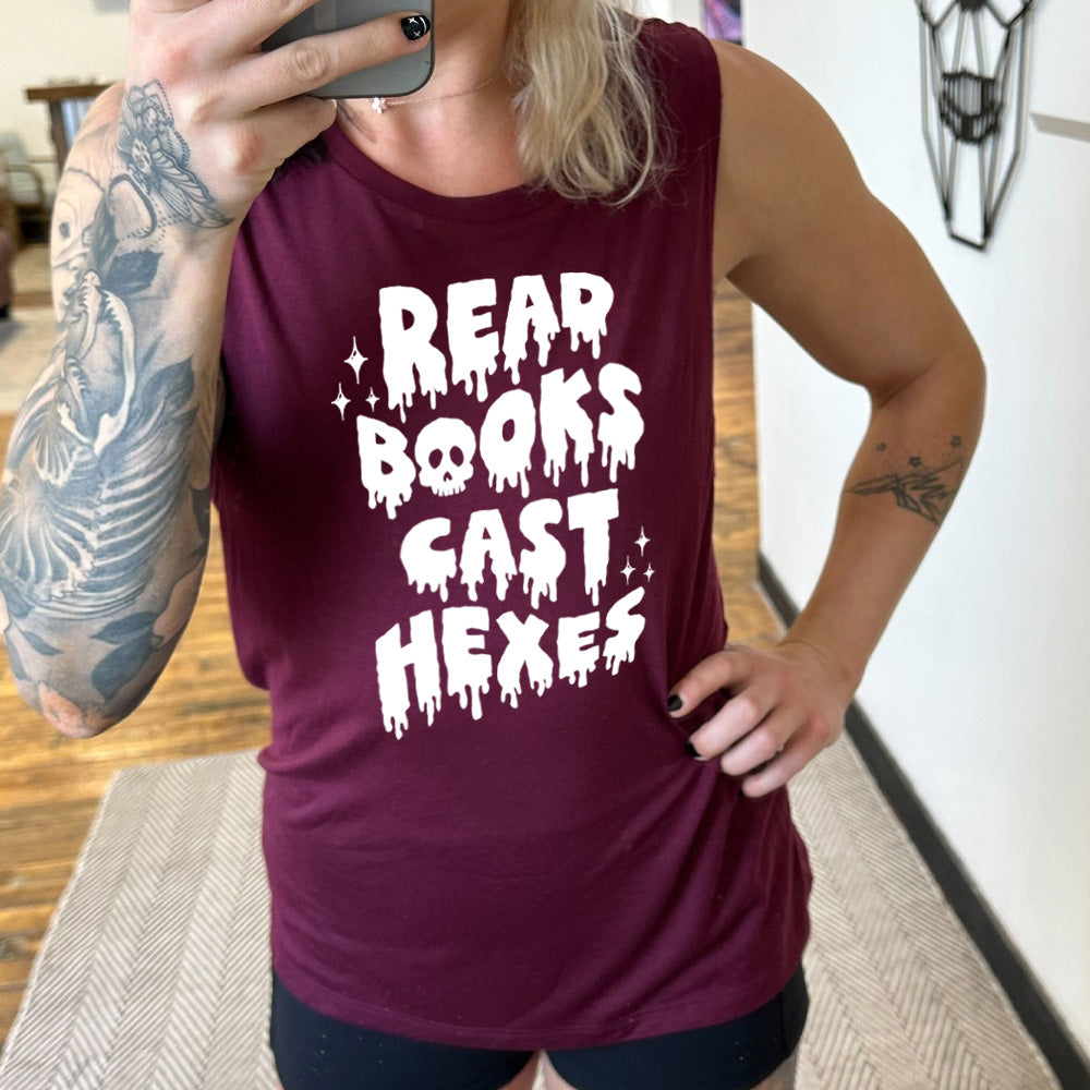 maroon muscle tank with the text "Read Books Cast Hexes" on it