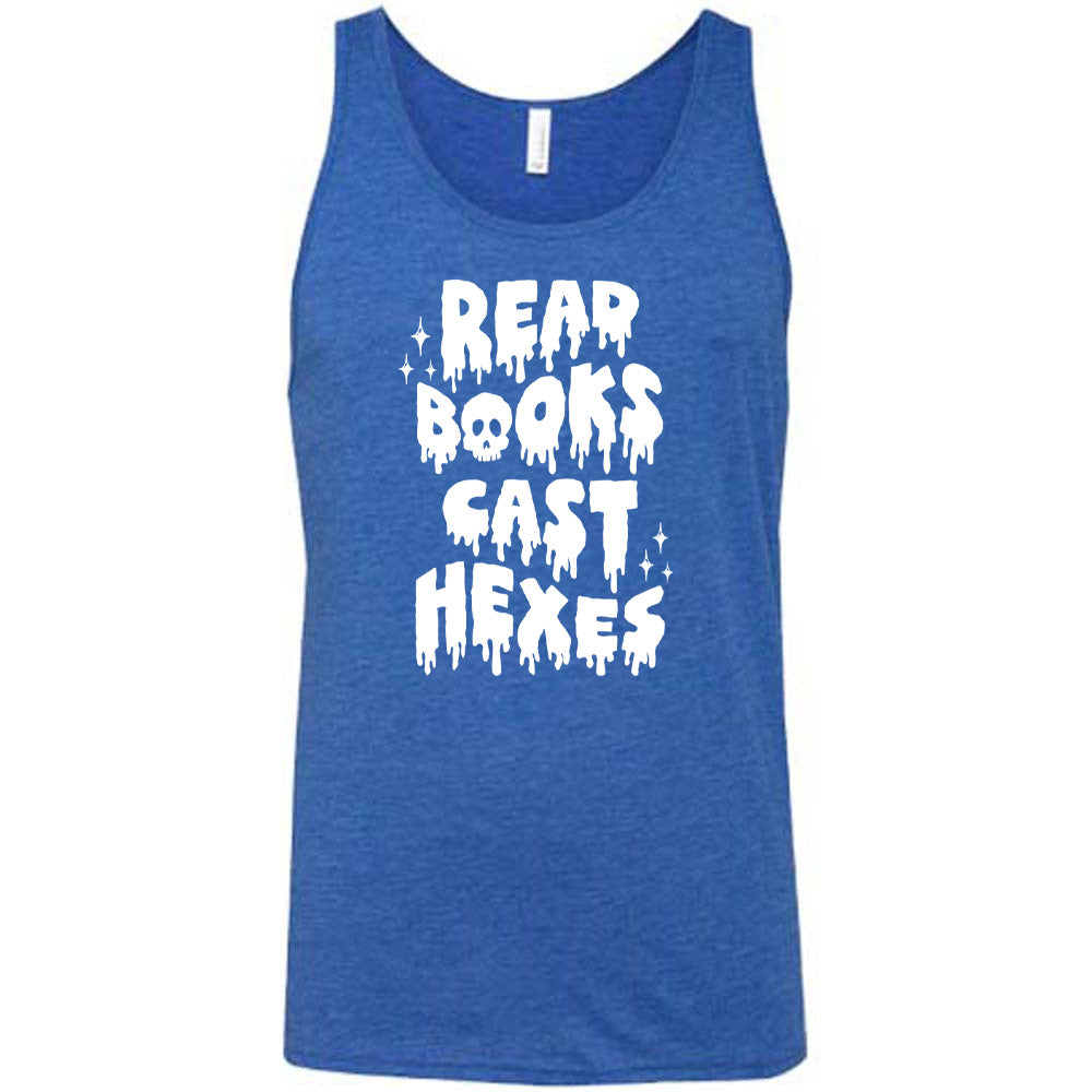 blue shirt with the text "Read Books Cast Hexes" on it
