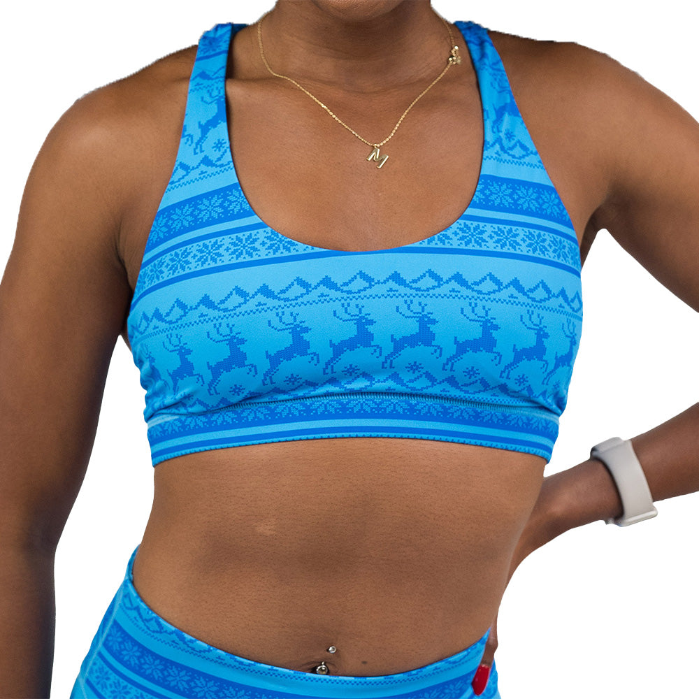 blue patterned sports bra with reindeer design
