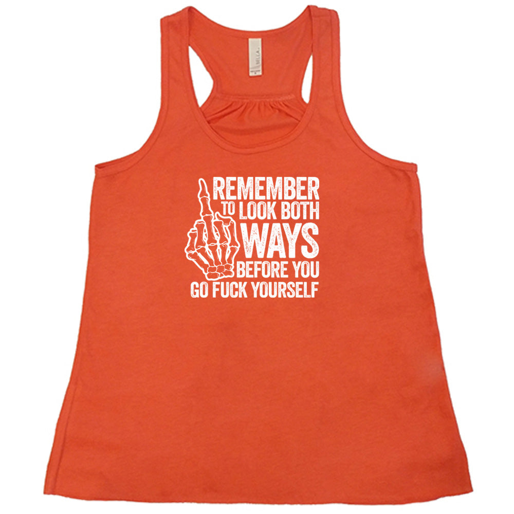 Coral colored flowy tank with a skeleton's middle finger graphic on it that says "Remember To Look Both Ways Before You Go Fuck Yourself"
