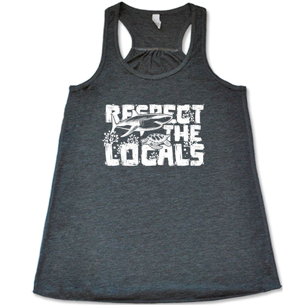 Grey colored flowy tank with a shark and turtle graphic on it that says "Respect The Locals" 
