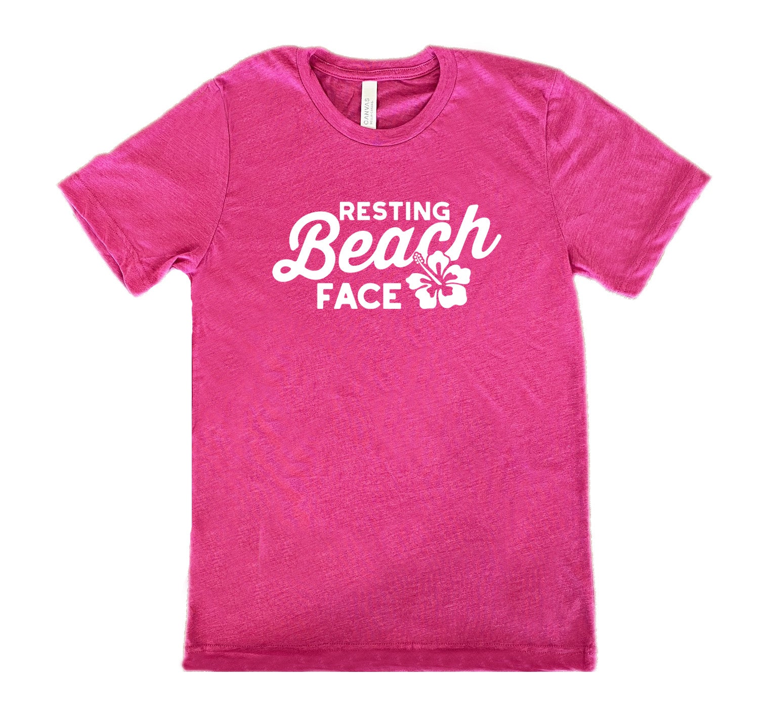 Berry colored shirt with a flower graphic on it that says "Resting Beach Face" 