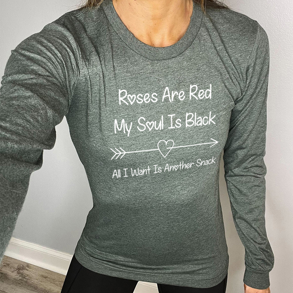 heather forest long sleeve shirt with the text "Roses Are Red My Soul Is Black All I Want Is Another Snack" on it, with the line-art graphic of an arrow going through a small heart