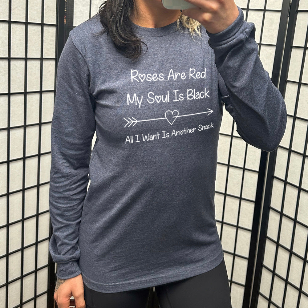 heather navy long sleeve shirt with the text "Roses Are Red My Soul Is Black All I Want Is Another Snack" on it, with the line-art graphic of an arrow going through a small heart