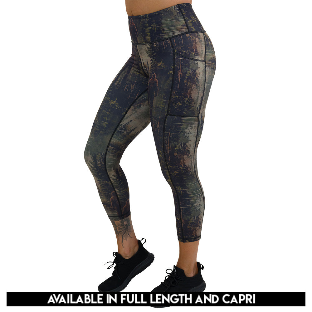 leggings with a forest design and a bigfoot graphic on it available in capri and full length