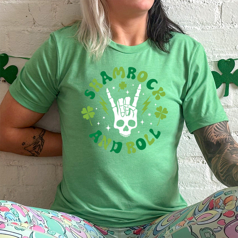 green shirt with the quote "Shamrock and Roll" on it