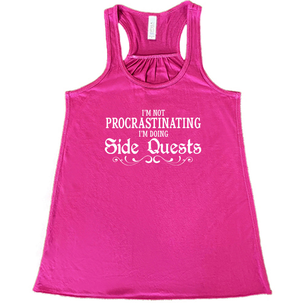 berry shirt with the text "I'm Not Procrastinating I'm Doing Side Quests" on it