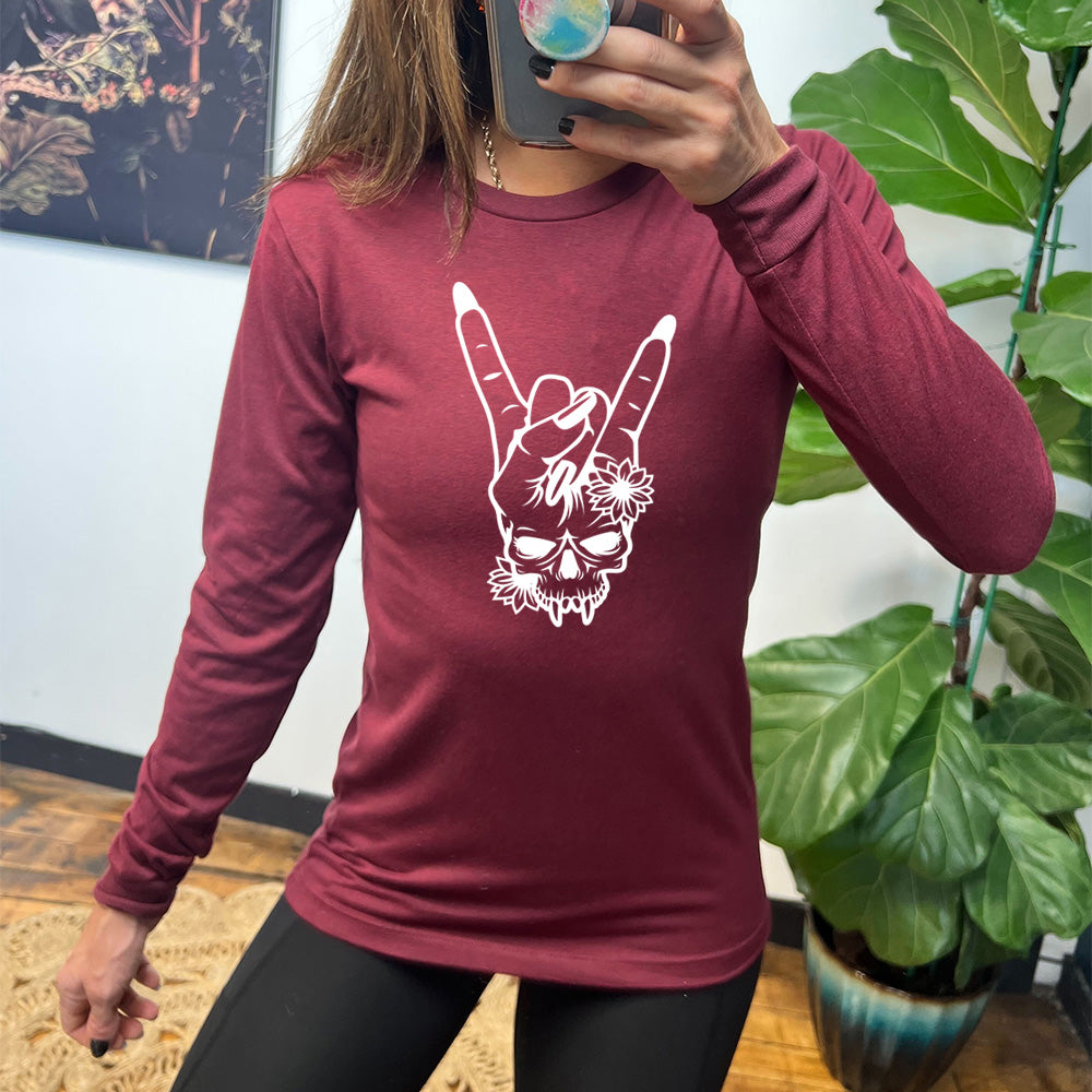 maroon shirt with a "Skull Rocker Hand" graphic on it