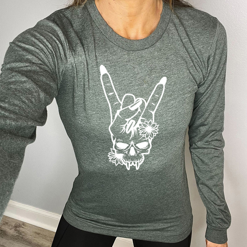 heather forest long sleeve shirt with the graphic of a skull whose head is a rocker hand symbol