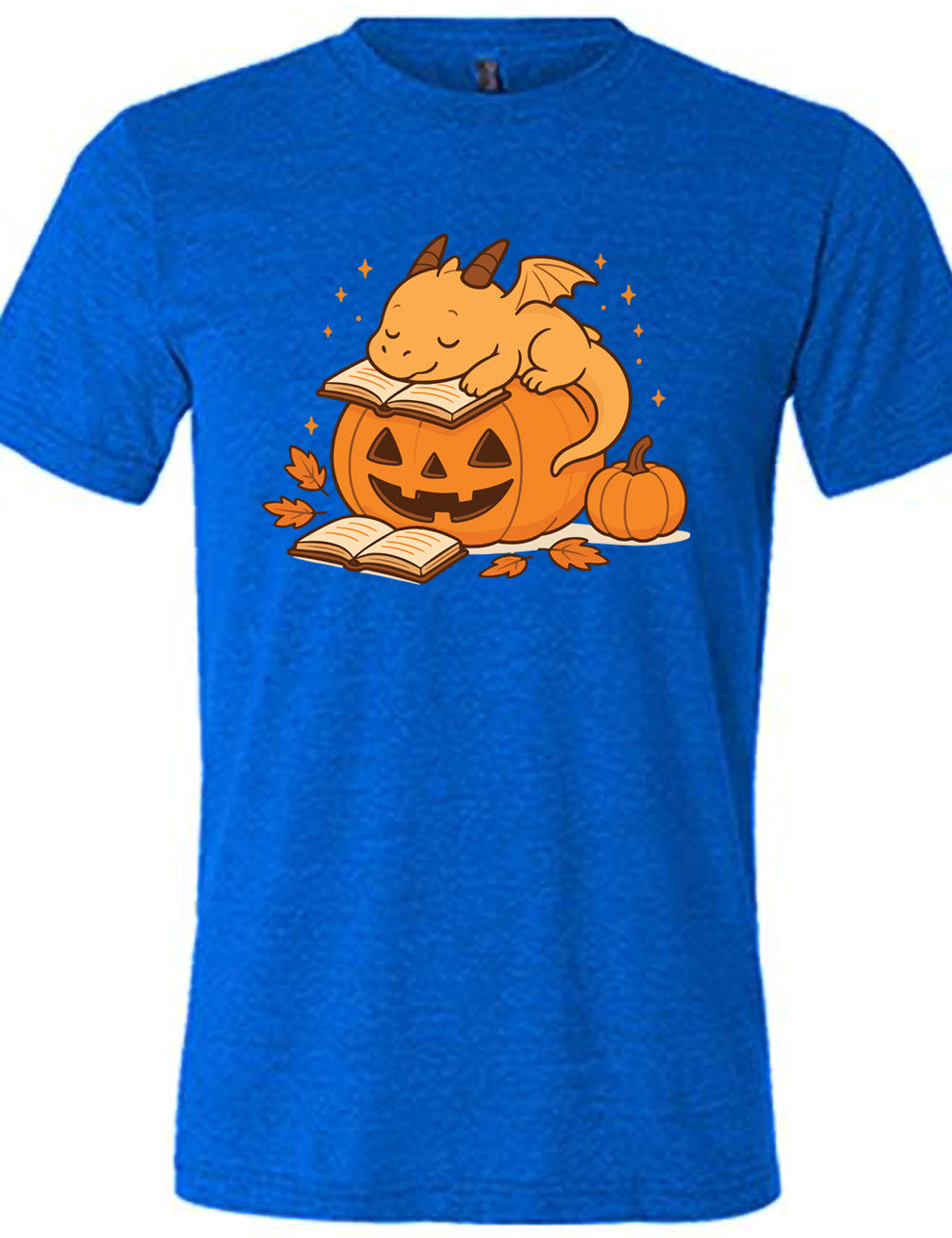 blue unisex tee with the graphic of a cartoon-style dragon sleeping, with its head in its open book, on top of a jack-o-lantern, with another open book and small pumpkin next to all this, and a scattering of stars, and a few leaves