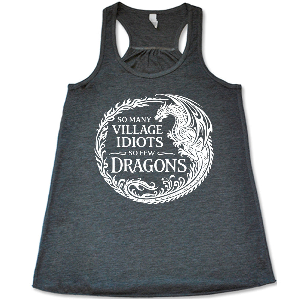 grey racerback tank with the graphic of a dragon, creating a circle from its tail plus flames, and the words "so many village idiots so few dragons" written within it