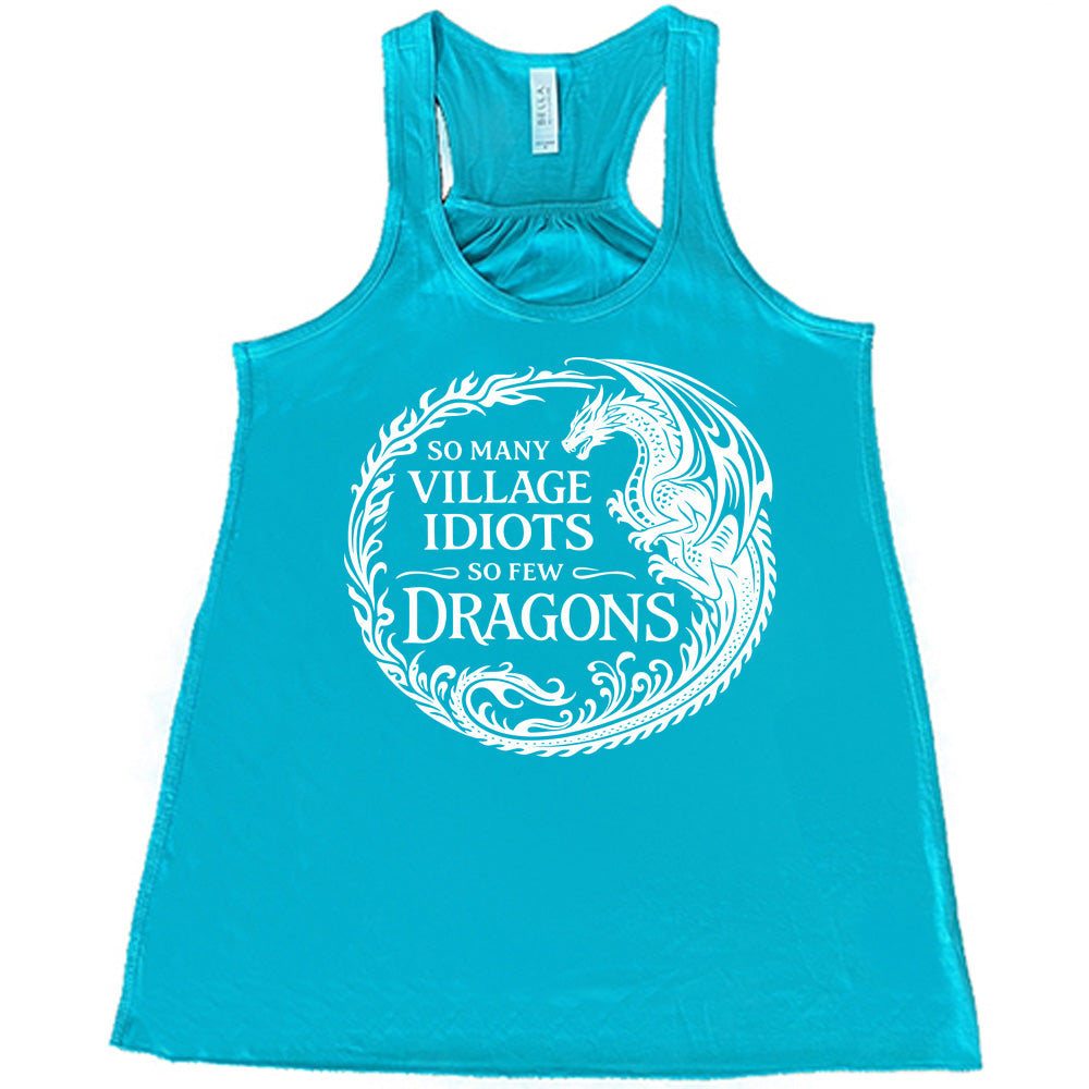teal racerback tank with the graphic of a dragon, creating a circle from its tail plus flames, and the words "so many village idiots so few dragons" written within it