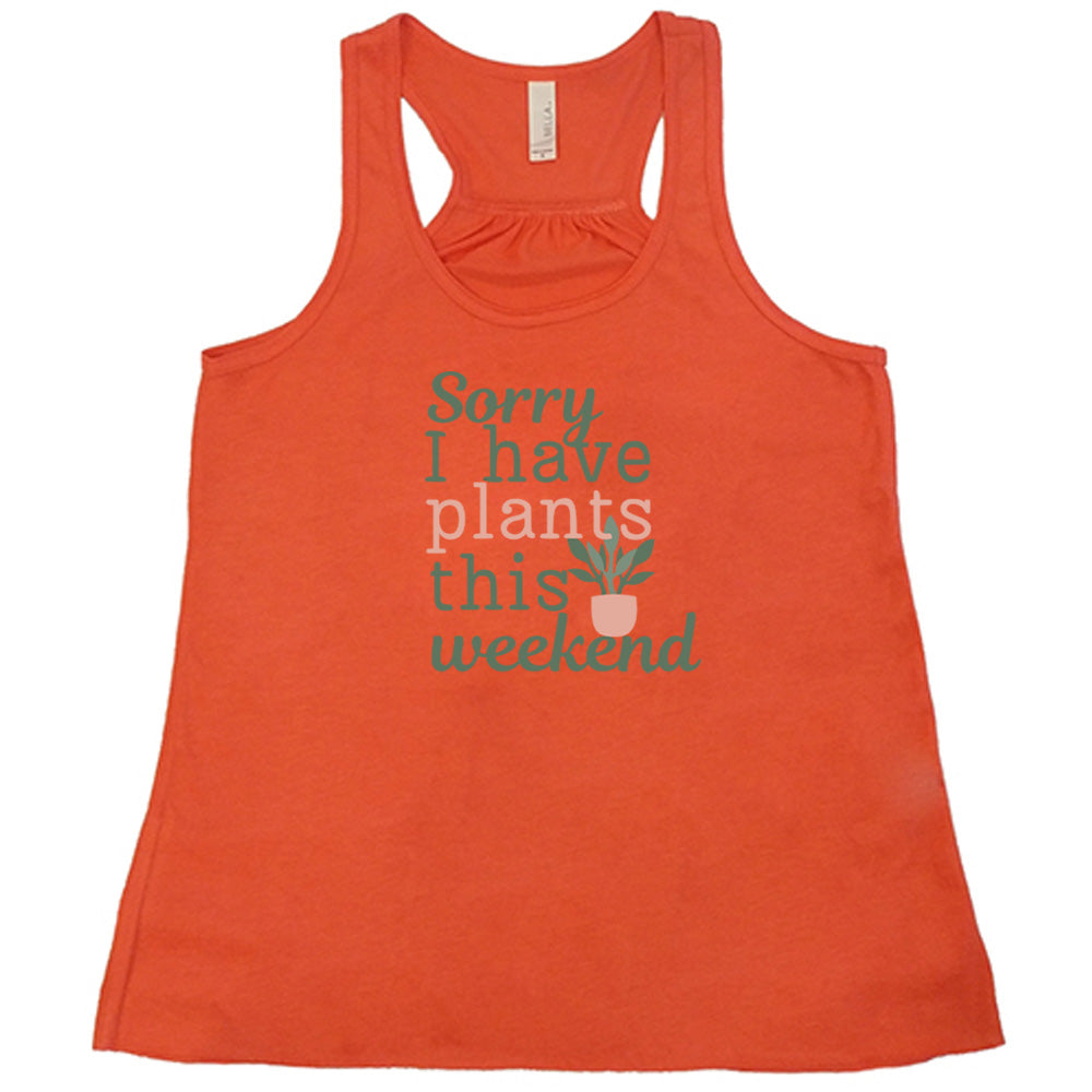 Coral colored flowy tank with a potted plant graphic on it that says "Sorry I Have Plants This Weekend"