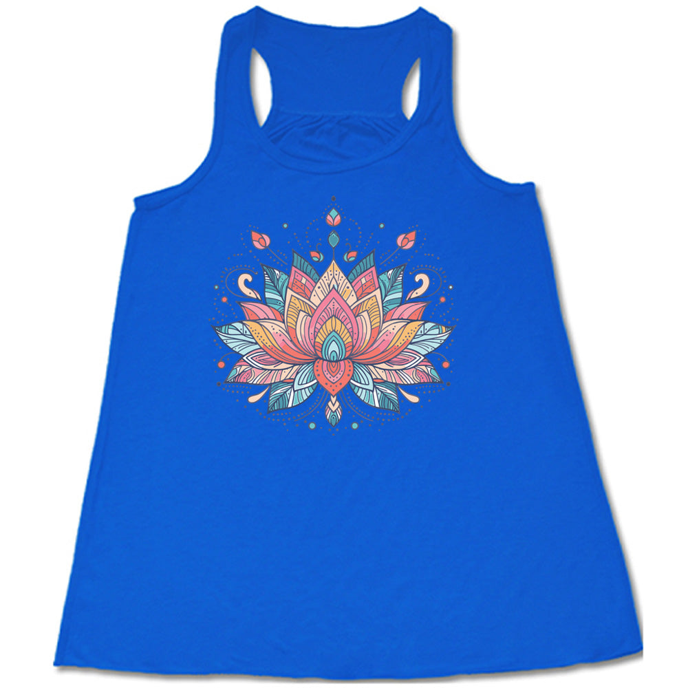 Blue flowy tank with the graphic of a colorful, stained-glass-look lotus flower