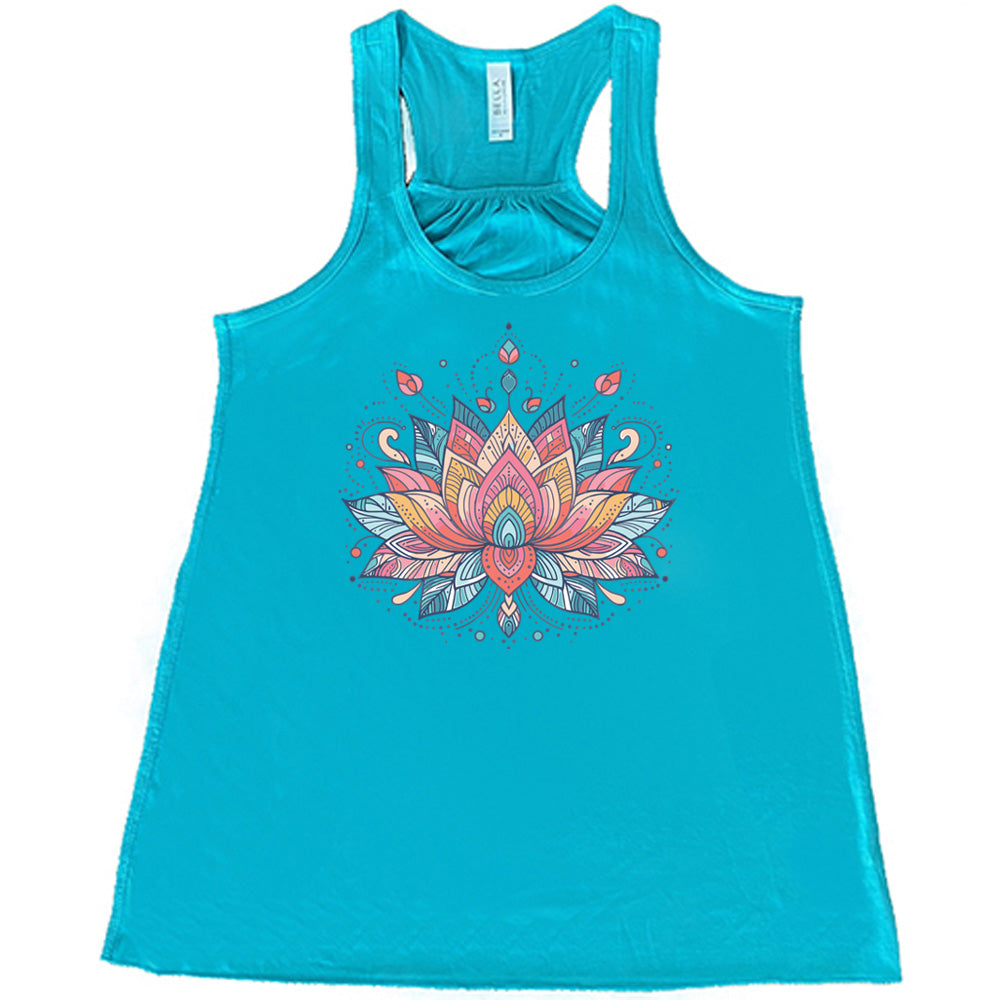 Teal flowy tank with the graphic of a colorful, stained-glass-look lotus flower