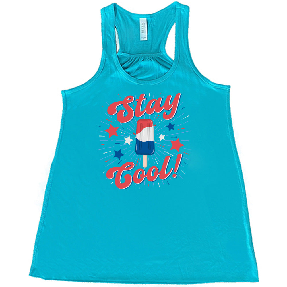 Teal colored flowy tank with a red white and blue popsicle graphic on it that says "Stay Cool!" 