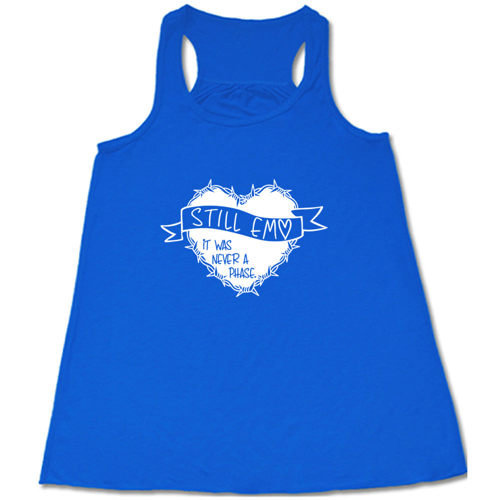 blue shirt with the text "Still Emo It Was Never A Phase" on it