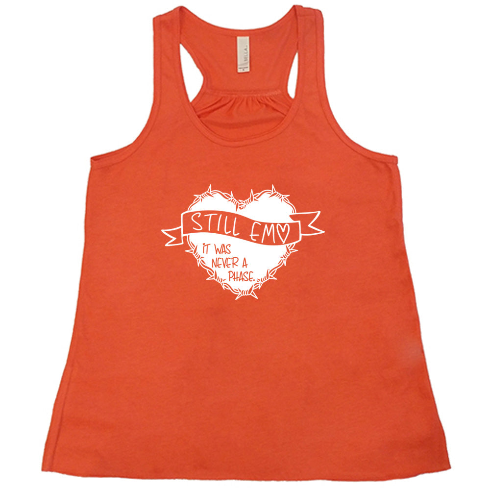 coral shirt with the text "Still Emo It Was Never A Phase" on it