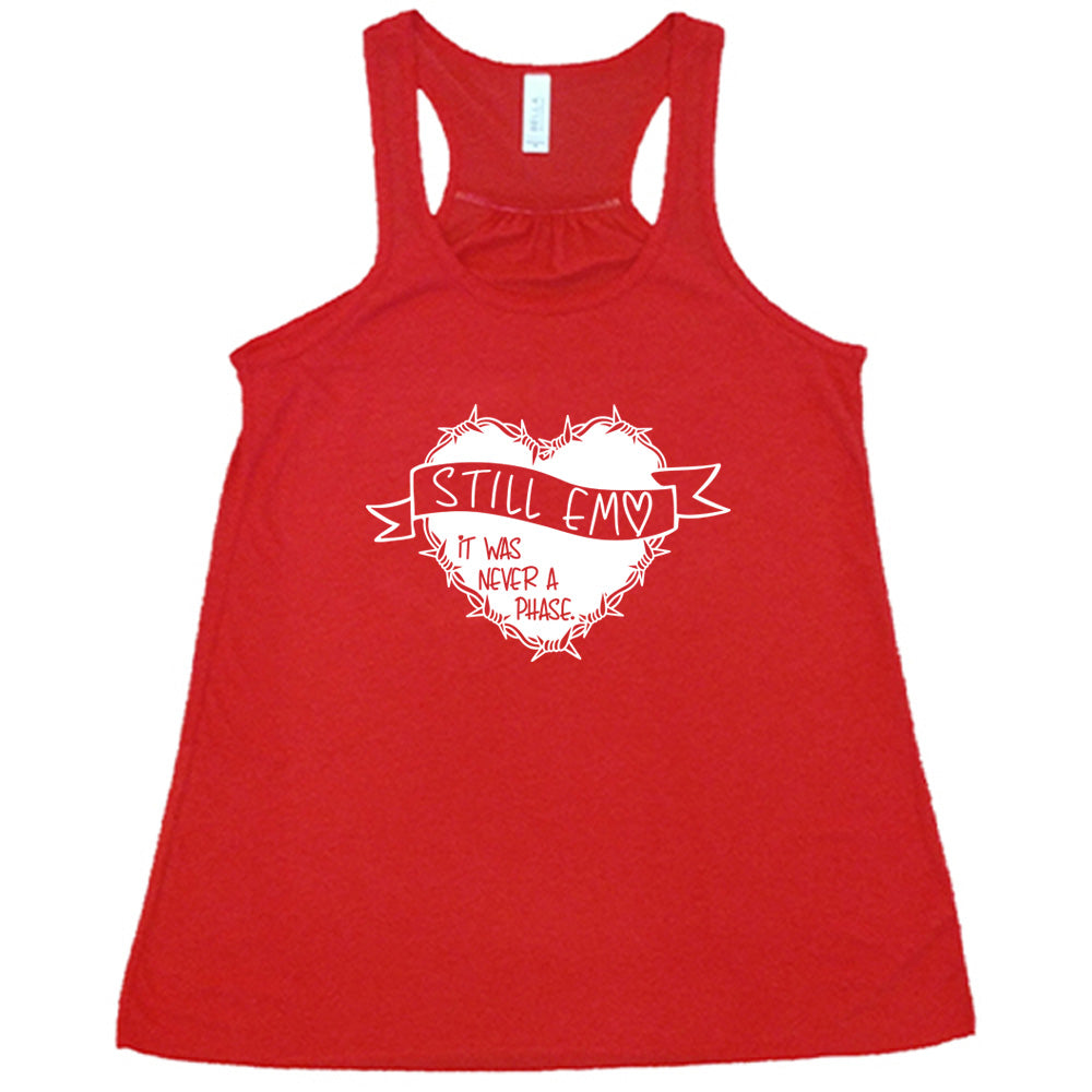 red shirt with the text "Still Emo It Was Never A Phase" on it
