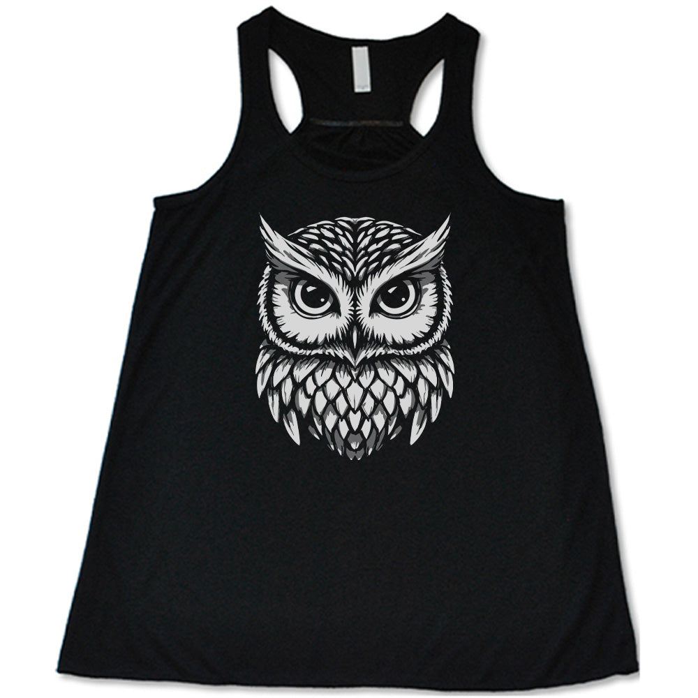 Black colored flowy tank with stylized owl graphic on it